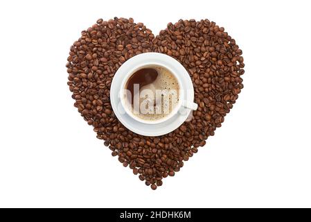 Heart shape from coffee beans with cup of coffee on white Stock Photo