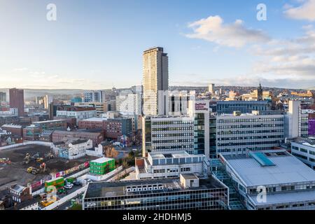 SHEFFIELD, UK - DECEMBER 16, 2021.  Sheffield city skyline showing The Arts Tower skyscraper and Hallam University buildings with copy space Stock Photo