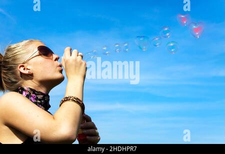 young woman, loving, blowing, bubble wand, girl, girls, woman, young women, romance, bubble wands Stock Photo