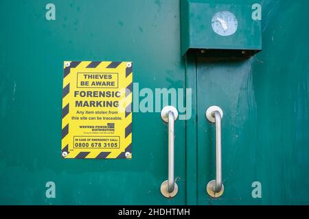 Close up of forensic marking sign on a Western Power Distribution electrical box, UK. Stock Photo