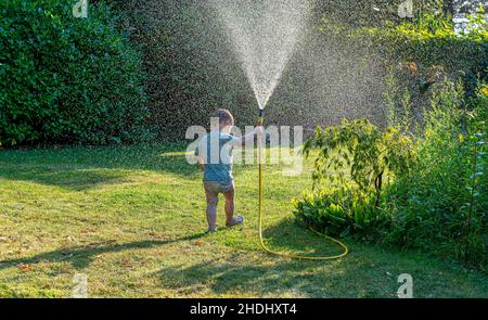 garden, summer, cooling, garden hose, gardens, summers, garden hoses Stock Photo