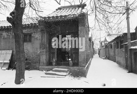 Traditional architecture of courtyard house in a Beijing hutong during winter Stock Photo