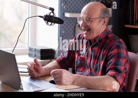 Senior businessman motivation speaker using video camera making video Stock Photo
