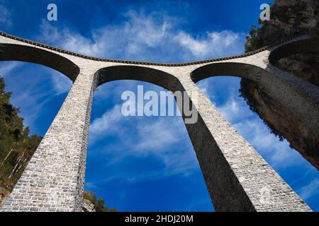 spectacular view at Train crossing Landwasser Viaduct Landwasserviadukt, Graubunden, Switzerland. Stock Photo