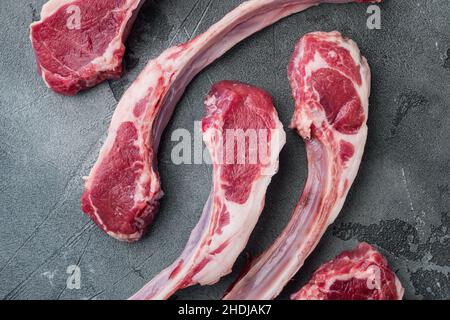 Uncooked mutton rack of lamb set, on white stone table background, top ...