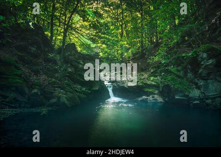 Waterfall in Acquerino nature reserve forest. Autumn season, Apennines, Tuscany region, Pistoia province, Italy, Europe Stock Photo