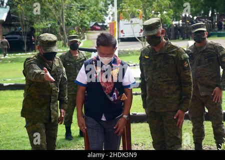 Bais, Philippines. 05th Jan, 2022. DPWH acting Secretary Roger G. Mercad, Lt. Gen. Robert C. Dauz PA Commander, Visayas Command, AFP with governor Governador Roel Ragay Degamo checked the devastation brought about by Typhoon Odette in Bais City, Philippines on January 5, 2022. They conducted site visit and inspected the on-going joint clearing operations by LGU-DPWH. (currently undertaking massive clearing activities along Negros, Cebu and Bohol) (Photo by Joseph C. Ceriales/Pacific Press/Sipa USA) Credit: Sipa USA/Alamy Live News Stock Photo