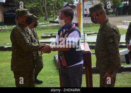 Bais, Philippines. 05th Jan, 2022. DPWH acting Secretary Roger G. Mercad, Lt. Gen. Robert C. Dauz PA Commander, Visayas Command, AFP with governor Governador Roel Ragay Degamo checked the devastation brought about by Typhoon Odette in Bais City, Philippines on January 5, 2022. They conducted site visit and inspected the on-going joint clearing operations by LGU-DPWH. (currently undertaking massive clearing activities along Negros, Cebu and Bohol) (Photo by Joseph C. Ceriales/Pacific Press/Sipa USA) Credit: Sipa USA/Alamy Live News Stock Photo