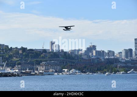 Seattle's downtown skyline as seen from across Lake Union, famous for its Seaplanes, at Gas Works Park in the Fremont neighborhood Stock Photo