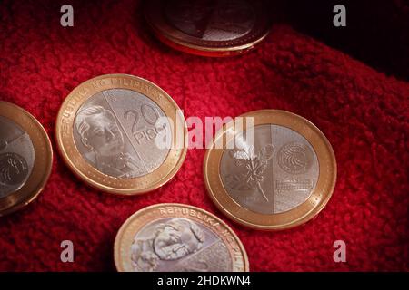 Peso coins by the Central Bank of the Philippines replaced the paper bill banknote of the same monetary value. Stock Photo