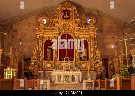 Miagao Church officially called Santo Tomás de Villanueva. Roman Catholic altar for Eucharist worship. A UNESCO World Heritage. Stock Photo