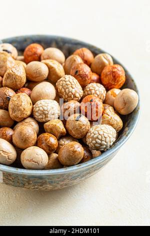 Food background Japanese roasted peanuts. Japanese Style peanuts are