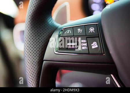 Close up steering wheel with multi function button. Luxury car interior Stock Photo