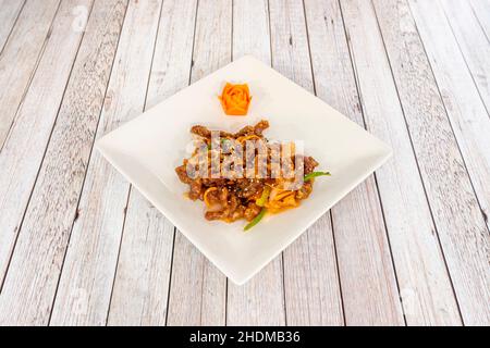 Beef strips in soy sauce with sugar, gives it that sweet touch that counteracts its rotundity. Vegetables should not be overcooked so that they do not Stock Photo