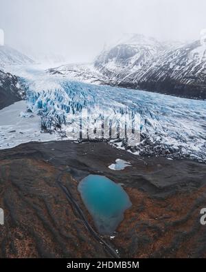 Aerial view of the glaciers and snowy mountains in Iceland Stock Photo ...