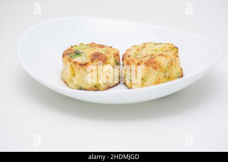 dish with broccoli omelette and turnip greens Stock Photo