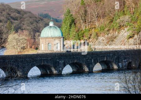 Garreg Ddu Dam,and Reservoir,with The Foel Tower,where drinking water that travels to Birmingham enters a 73 mile pipeline here,at,Elan Valley, Elan Valley Estate,owned,by,Dwr Cymru,Welsh Water,west, of,Rhayader, Powys,Mid,West Wales,Welsh,Elan Valley,is,1% of Wales,covers,an,area,of,72,square,miles,and,is,known,as,Lake District, of Wales,Lake District of Wales, There are 6 dams in the area creating reservoirs that were built a hundred years ago,and,are,an,epic,feat,of,civil,engineering,feeding into a 73 mile gravity driven aqueduct to supply clean water to the city of Birmingham,England. Stock Photo