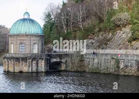 Garreg Ddu Dam,and Reservoir,with The Foel Tower,where drinking water that travels to Birmingham enters a 73 mile pipeline here,at,Elan Valley, Elan Valley Estate,owned,by,Dwr Cymru,Welsh Water,west, of,Rhayader, Powys,Mid,West Wales,Welsh,Elan Valley,is,1% of Wales,covers,an,area,of,72,square,miles,and,is,known,as,Lake District, of Wales,Lake District of Wales, There are 6 dams in the area creating reservoirs that were built a hundred years ago,and,are,an,epic,feat,of,civil,engineering,feeding into a 73 mile gravity driven aqueduct to supply clean water to the city of Birmingham,England. Stock Photo