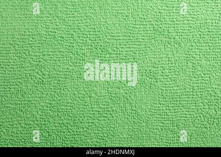 Microfiber Towel green Terry Texture Wrist Watch. Microfiber cloth with close-up. Fabric structure background. Fabric blue pattern. Cleaning service. Stock Photo