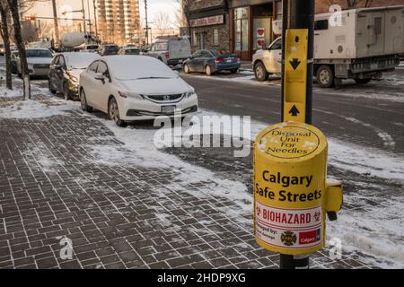 Calgary, AB, Canada - December 13, 2021: Safe needle disposal container on city street. Stock Photo