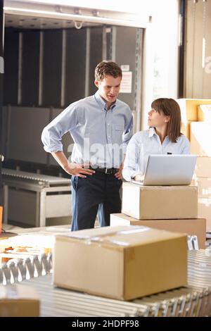 logistics, parcel, warehouse clerk, logistic, trade, parcels, warehouse clerks Stock Photo