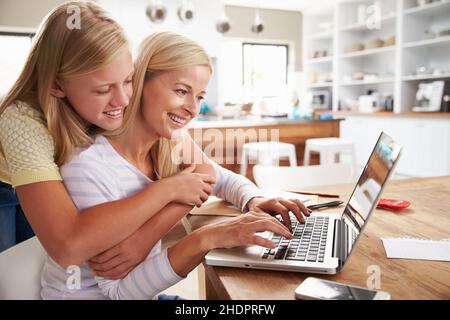 mother, laptop, daughter, mom, mothers, mum, computer, computers, laptops, daughters Stock Photo