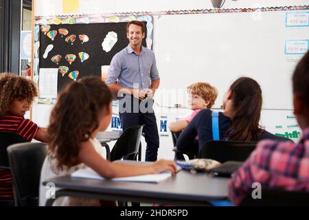 pupils, class, teacher, elementary school, school childrens, school presenter, teachers Stock Photo