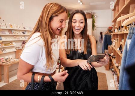 fashion, shop, friends, smart phone, fashions, retail, shops, friend, smart phones, smartphone, smartphones Stock Photo