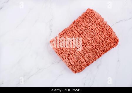 Fresh raw ground beef isolated on white background. Top view. Stock Photo