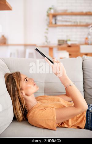 woman, reading, electronic book, tablet-pc, female, ladies, lady, women, read, reading a book, reading something, to read, electronic books, ipad, Stock Photo