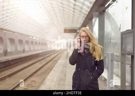 young woman, railroad station, delay, girl, girls, woman, young women, railroad stations, delays Stock Photo