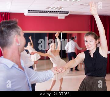 People practicing lindy hop movements Stock Photo