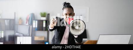 African American Man Shouting Loud In Megaphone Speaker Stock Photo