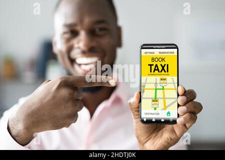 Cab Booking And Online Taxi App On Mobile Phone Stock Photo