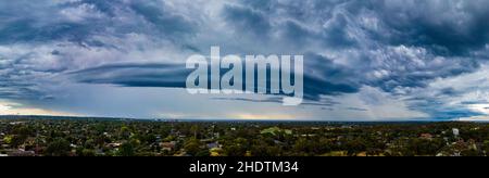 Frankston, Victoria, Australia, January 07, 2022: Panoramic of Menacing Storm Front Arcus Shelf Cloud Approaching Stock Photo