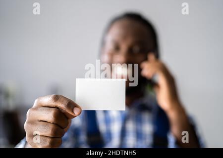 Constructor Business Contractor With Blank Visiting Card Stock Photo