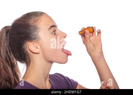 taking medicine, mouth open, globuli, taking medicines, taking pills, mouth opens, open mouth, opened mouth, globulis Stock Photo