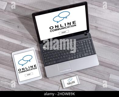 Online communication concept shown on different information technology devices Stock Photo