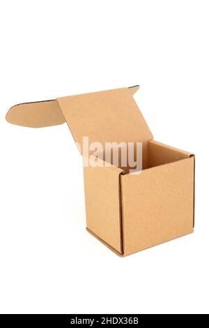Cube shaped brown cardboard box container with lid open on white background. Recycled and environmentally friendly concept. Copy space. Stock Photo