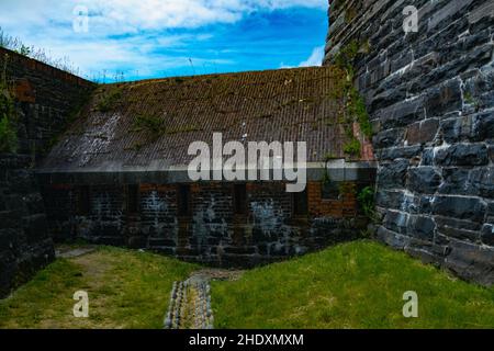 the dry moat that circles fort charlotte Stock Photo