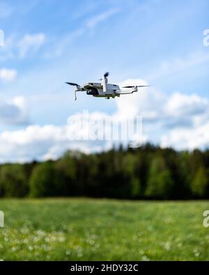 flying drone in summer Stock Photo