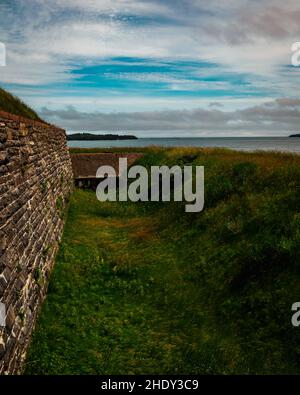 the dry moat that circles fort charlotte Stock Photo