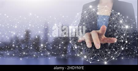 Global database and artificial intelligence. Hand touch digital screen hologram Artificial intelligence sign on city light blurred background. Neural Stock Photo