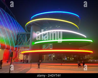Doha, Qatar – October 1, 2019: Colorful facade of illuminated Khalifa International Stadium in Doha, Qatar at night Stock Photo