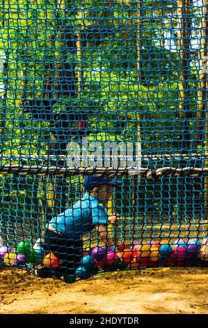 Boy climbing on a obstacle route Stock Photo