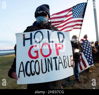 Jan. 6, 2022. Nahant, MA. North Shore residents held a vigil at the Nahant rotary to commemorate the first-year anniversary of the attack on the U.S. Stock Photo