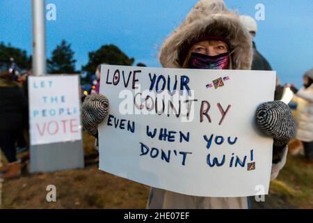 Jan. 6, 2022. Nahant, MA. North Shore residents held a vigil at the Nahant rotary to commemorate the first-year anniversary of the attack on the U.S. Stock Photo