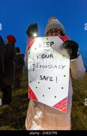 Jan. 6, 2022. Nahant, MA. North Shore residents held a vigil at the Nahant rotary to commemorate the first-year anniversary of the attack on the U.S. Stock Photo