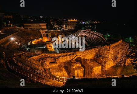 Ancient Roman Amphitheater in Tarragona at night in Catalonia Stock Photo