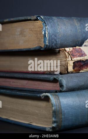 A stack of old vintage hardback books. Stock Photo